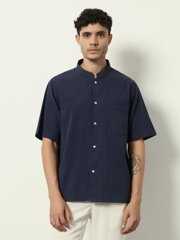 Modern Minimal: Structured Navy Shirt with Statement Simplicity"